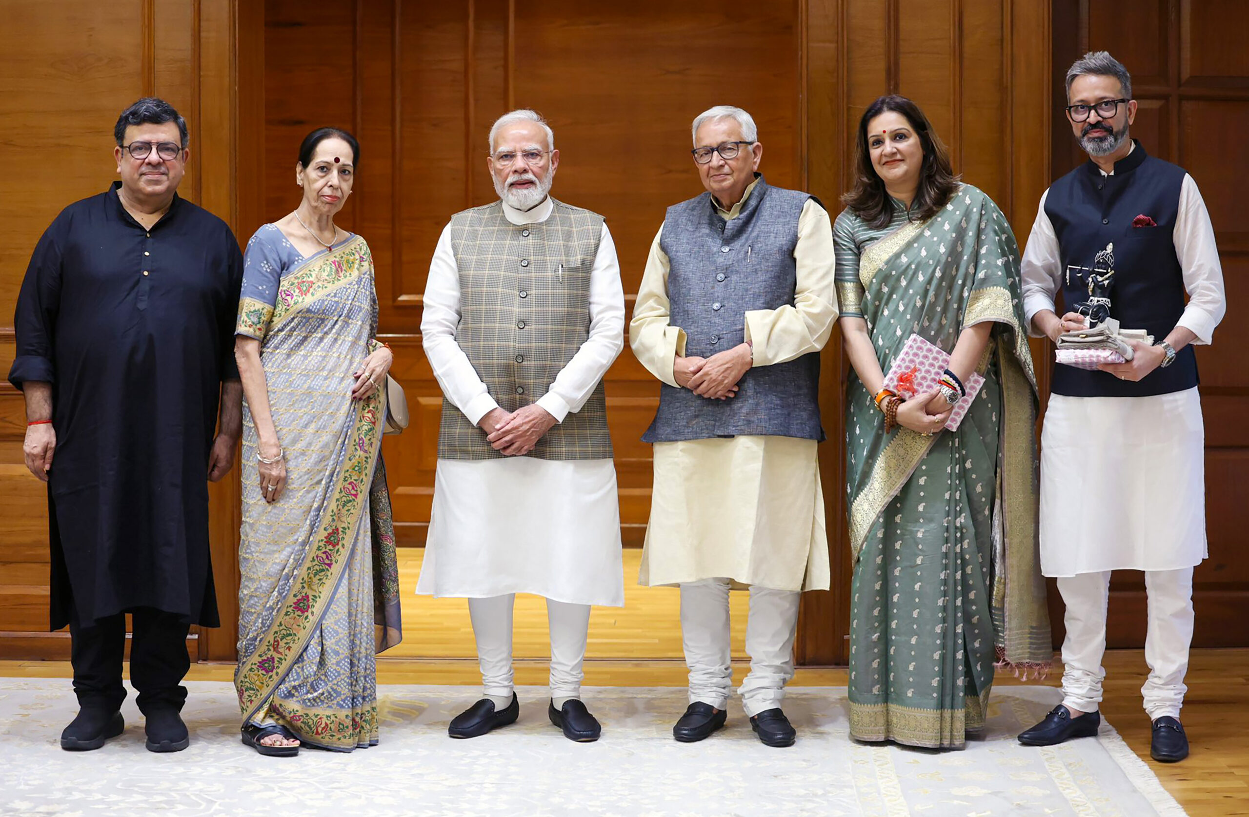 New Delhi: PM Modi Receives Book on Braj from Priyanka Chaturvedi's Father #Gallery New Delhi: PM Modi Receives Book on Braj from Priyanka Chaturvedi's Father #Gallery