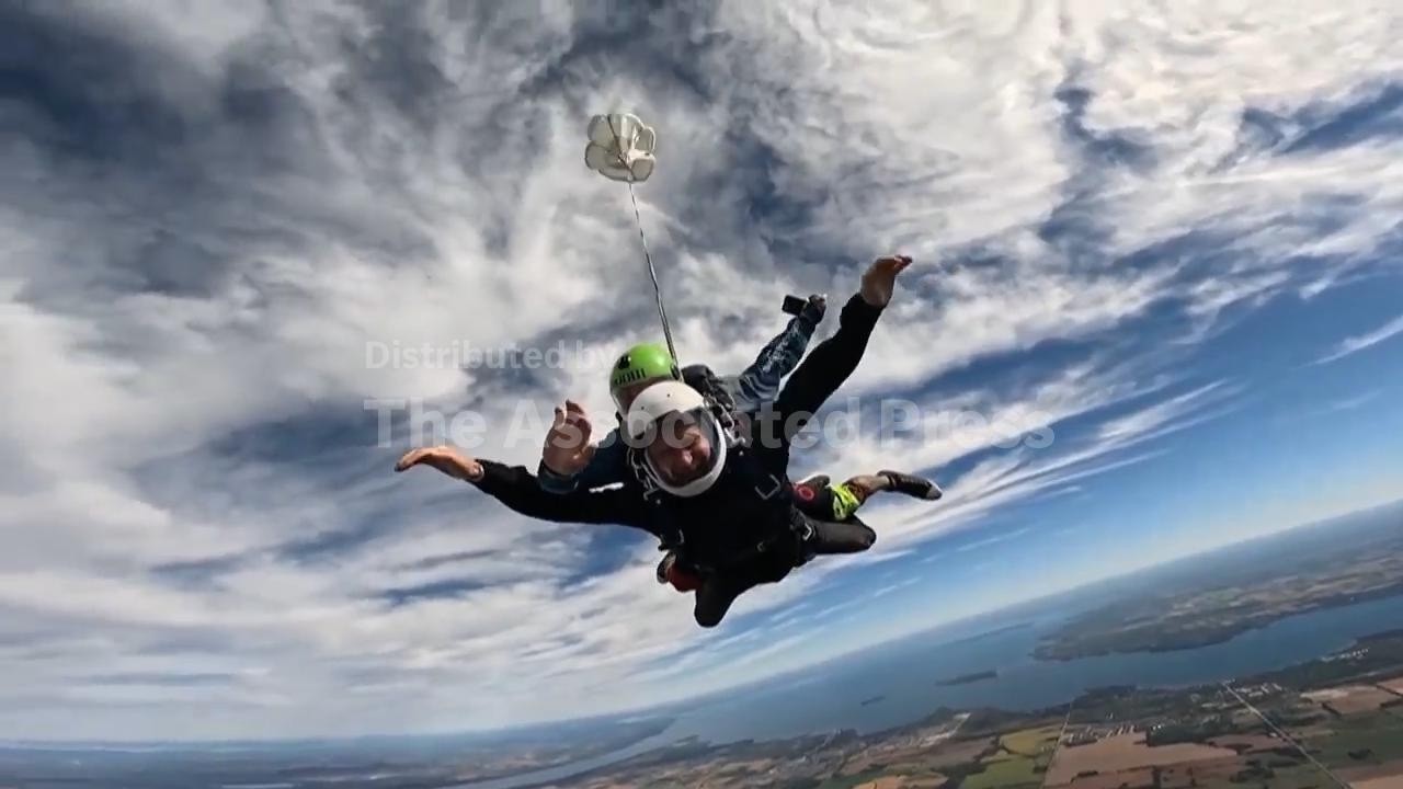 UK's Prince Harry fulfils skydiving promise to Canadian veteran (Video)