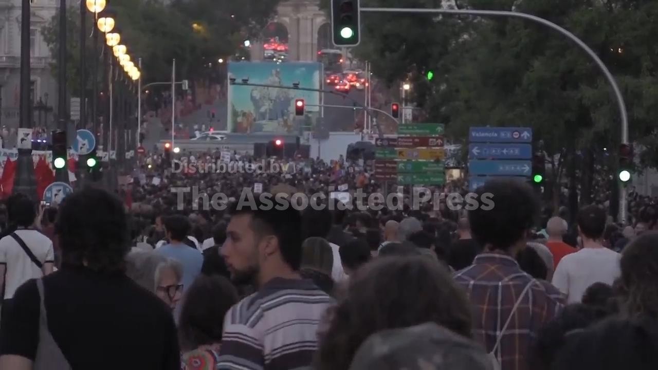 Thousands of people take to the streets of Madrid to protest against Spain's housing crisis (Video)
