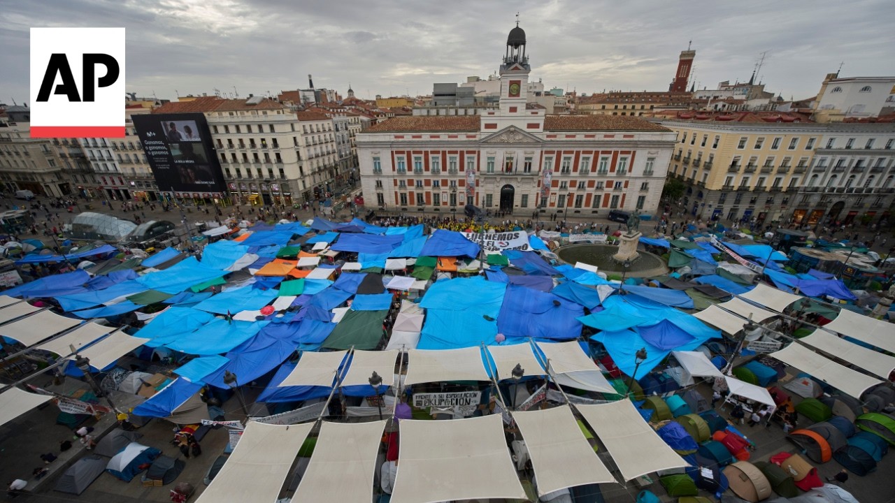 Spain housing protesters pack Madrid square demanding protection for tenants (Video)