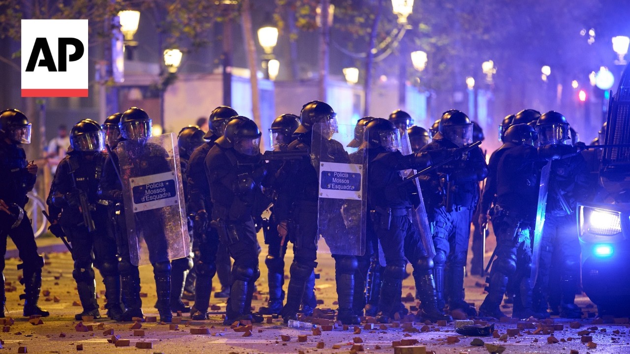 Protestors clash with police in Barcelona as thousands attend Spain housing protests (Video)