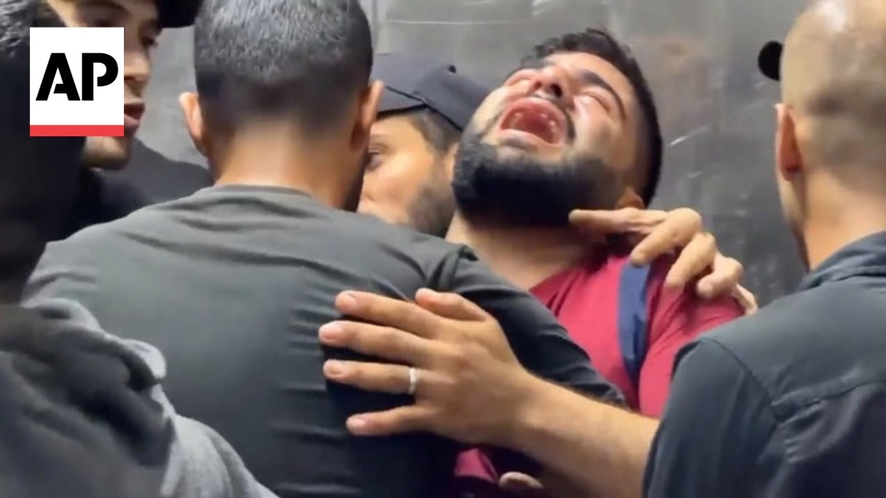 Relatives mourn loved ones after Israeli strike hits vehicle in Gaza, killing 2 (Video)