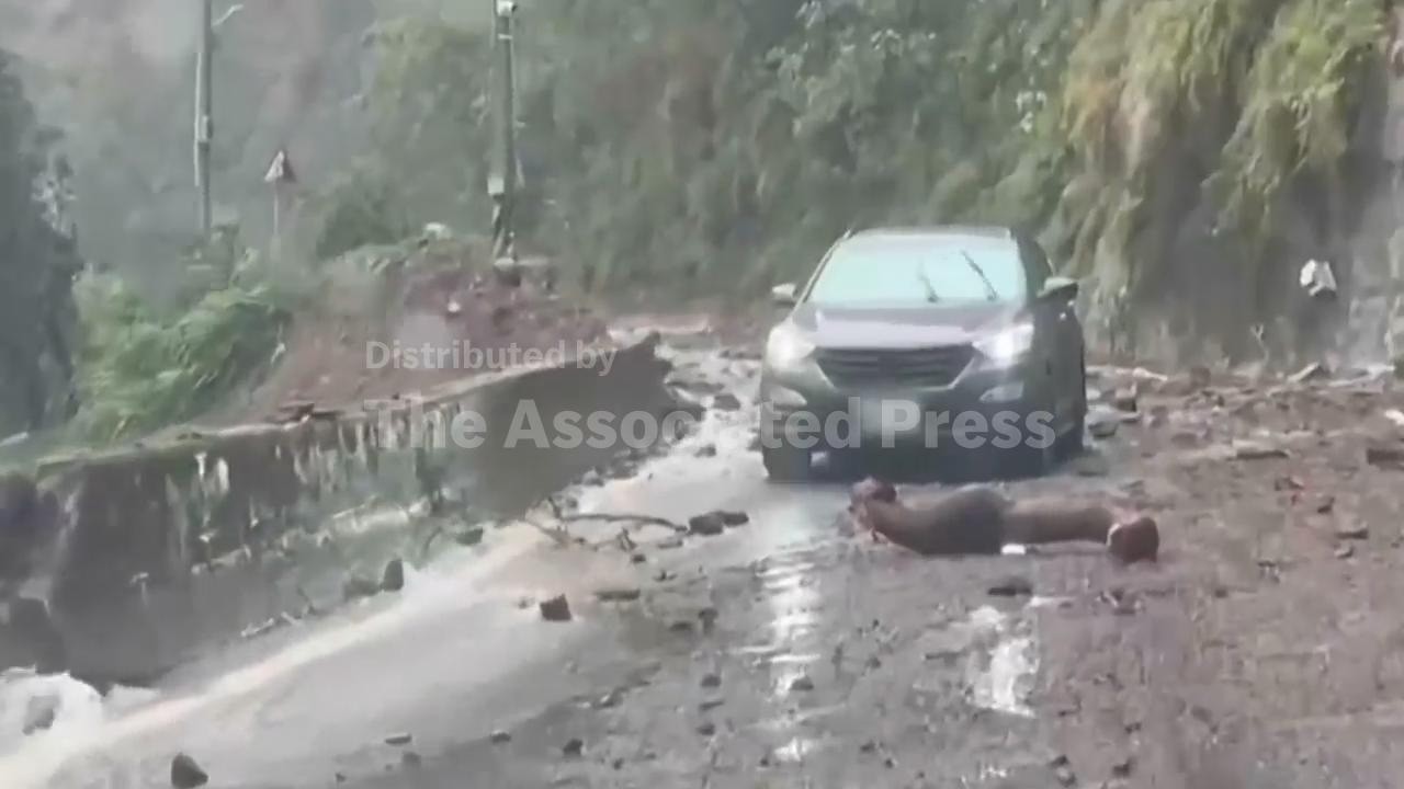 Typhoon Champi uproots trees, capsizes boat and brings down scooters in Taiwan (Video)